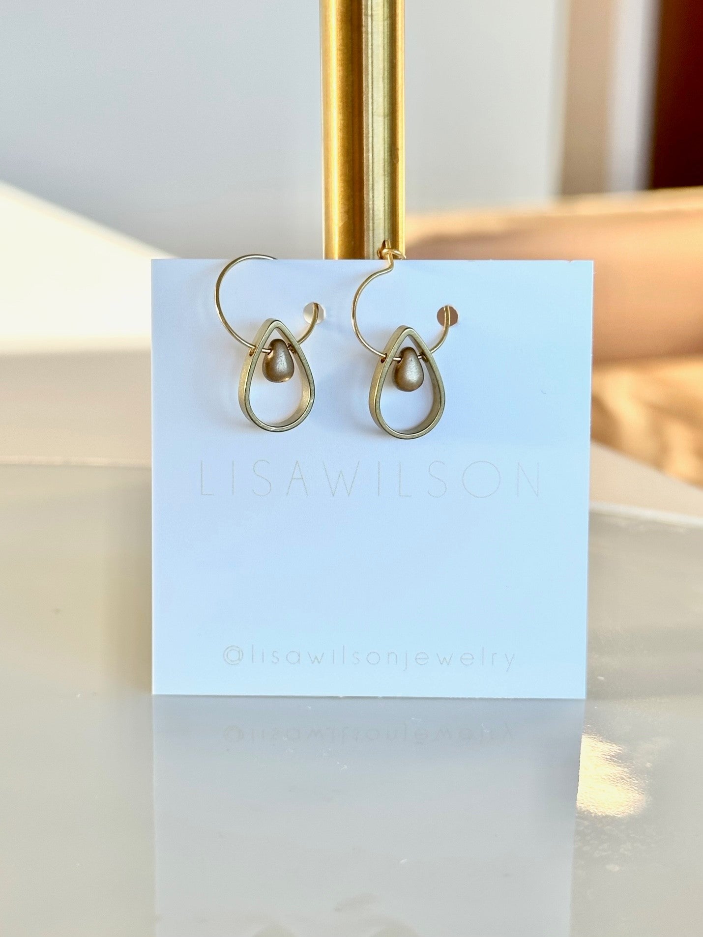 Small Brass Hoop Earrings with Teardrop Cutout and Droplet Bead