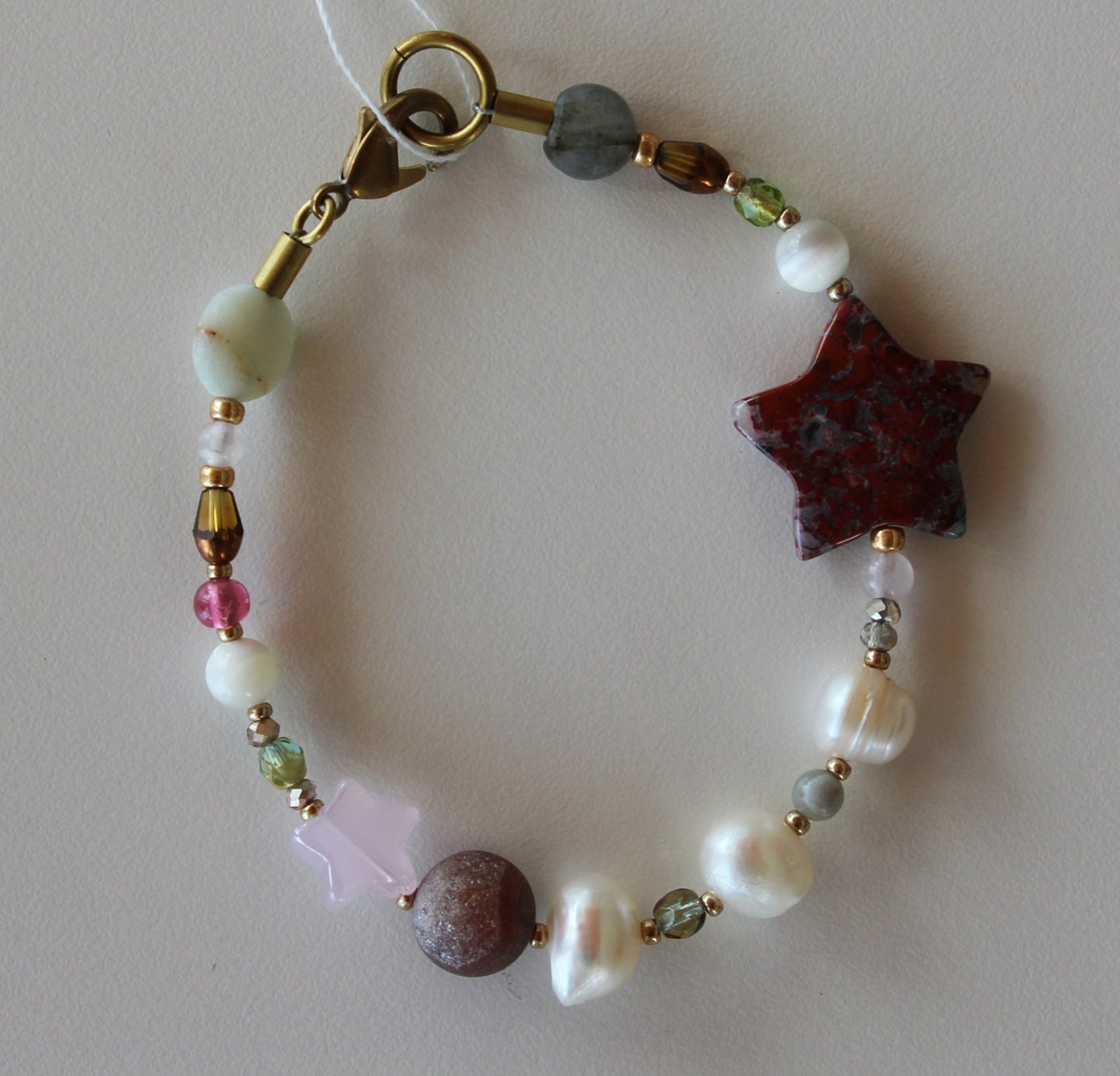 Lisa Wilson, big red star bracelet