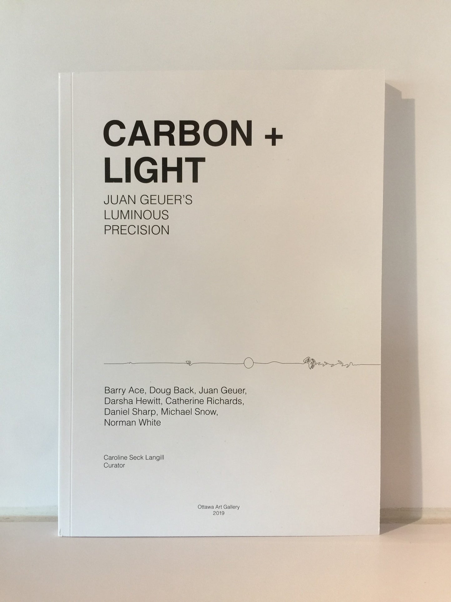 CARBON + LIGHT: JUAN GEUER'S LUMINOUS PRECISION